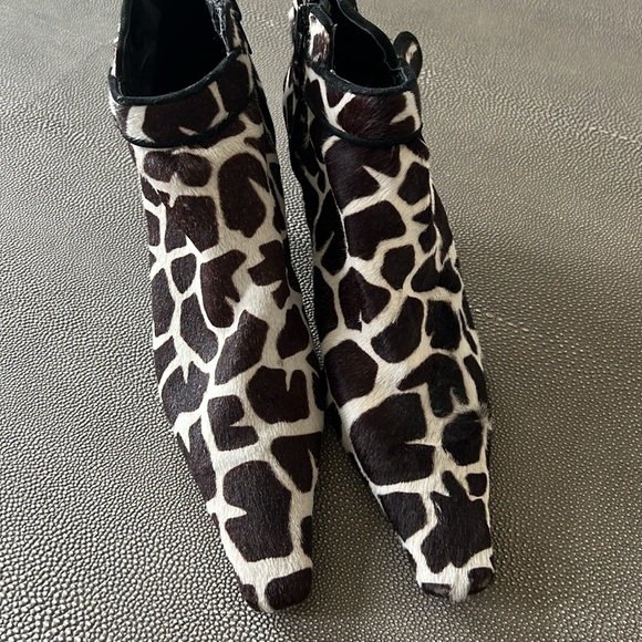 Leather and fur booties from Saks. - Picture 2 of 5